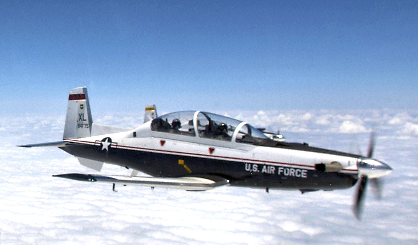 OVER LAUGHLIN AIR FORCE BASE, Texas -- A T-6 Texan pilot flies in formation with another T-6 here May 19. The T-6 is replacing the T-37 Tweet as the primary trainer for Air Force pilots. (U.S. Air Force photo by Tech. Sgt. Jeffrey Allen)