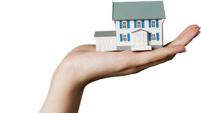 Hand holding house